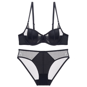 Sexy black lingerie set featuring satin and sheer mesh bra with matching brief
