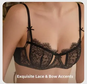 Close-up of black eyelash lace bra featuring delicate bow detail and sheer texture