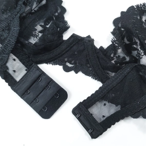 Detailed back view of black lace bra featuring floral mesh and adjustable hook closures