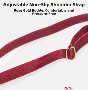 Detail view of burgundy adjustable non-slip bra strap with rose gold metal adjustment buckle