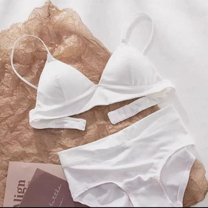 White seamless triangle bralette and panty set with thin straps and smooth finish