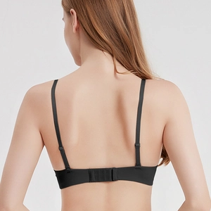 Back view of seamless black plus size bra with adjustable straps and hook-and-eye closure