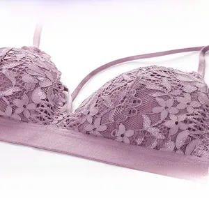 Detailed close-up of purple floral lace texture and fine straps on this wireless bra