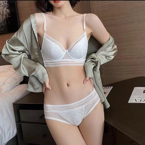 French style white lace lingerie set with U-shaped back and thin straps on a model