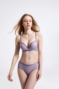 Detail of light purple lattice lingerie set with push-up cups and mesh texture