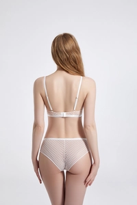 Detail view of the back of creamy white mesh lace lingerie set with adjustable straps