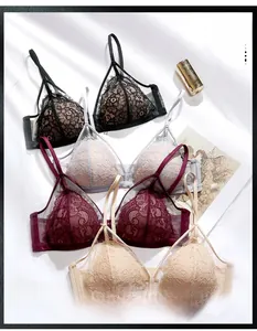Détail de soutiens-gorge français en dentelle de cils noir, rouge vin et beige