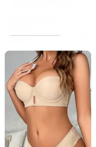 Detail of beige seamless push-up strapless bra with hollow center decorative design