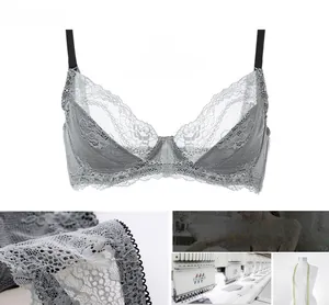 Close-up of grey floral lace bra detailing with unpadded mesh and embroidery texture