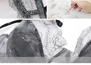 Close-up of grey floral lace lingerie showing breathable mesh and intricate scalloped edges