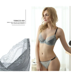 Close-up of tobacco ash floral lace detailing on the sheer bra and matching panty set