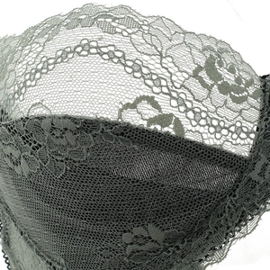 Lace lingerie set with sheer floral embroidery and mesh details in sage green