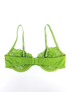 Detailed back view of lime green lace bra with floral embroidery and adjustable straps