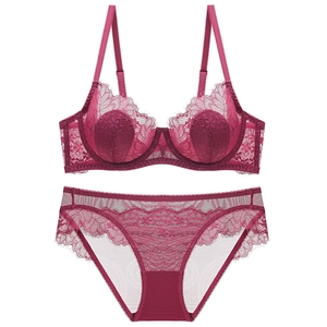 Berry red lace lingerie set with eyelash lace bra and matching panties on white background