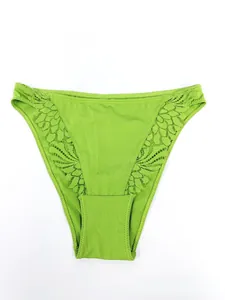 Close-up of bright green mid-waist panties with delicate floral lace side panels