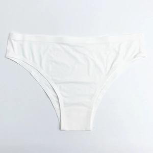 Seamless low-waist white panties with smooth elastic fabric and flat laser-cut edges