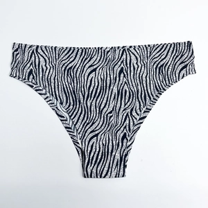 Detail view of seamless zebra print panties with smooth stitching and soft elastic fabric