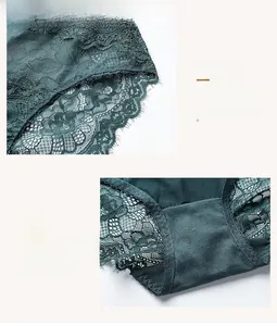 Close-up of dark green lace underwear showing fine mesh texture and precise stitching detail