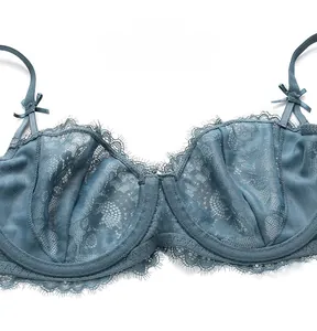 Detailed macro view of blue eyelash lace 3D cup bra with elegant bow decoration