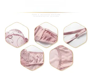 Détails de broderie florale rose et bretelles festonnées ajustables sur un soutien-gorge