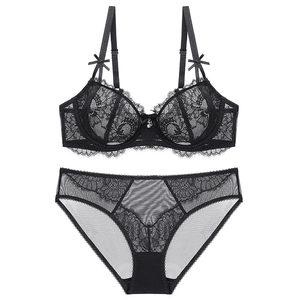 Lace lingerie set with black 3/4 cup bra and matching sheer mesh panties on white background