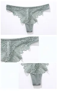 Detail eines salbeigrünen Spitzen-Strings mit Blumenstickerei und Doppelfutter