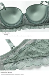 Detail of light green lace bra showing push-up cup padding and breathable side wings
