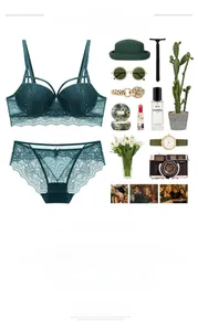 Flat lay view of dark green lace lingerie set with push-up bra and matching panties