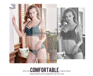 Detail of dark green lace lingerie set with halter neck straps and eyelash trim