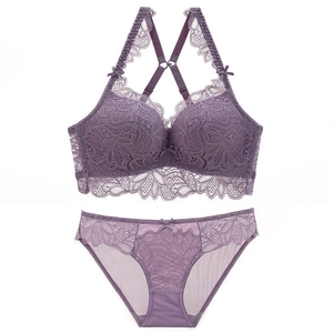 Purple lace lingerie set featuring floral embroidery and cross-back bra with matching briefs