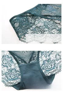 Detailed view of dark green floral lace panties featuring a soft cotton crotch lining
