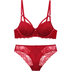 Lace push-up bra set in red featuring floral embroidery and cross strap details