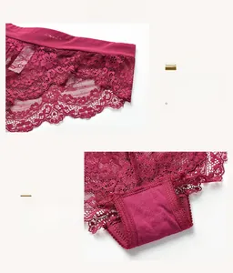 Détail macro de sous-vêtements en dentelle bordeaux avec broderie florale et couture soignée