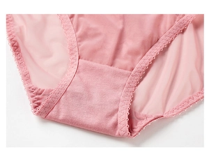 Detail view of pink lace underwear with breathable mesh and cotton crotch stitching