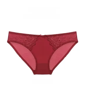 Detailed view of wine red lace embroidery and silky fabric on low-rise panties