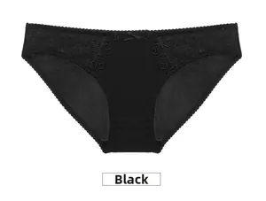Detail of black silk panties with delicate lace embroidery and a center bow accent