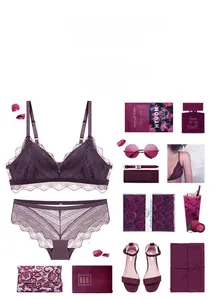Flat lay of a deep purple lace bralette set with matching panties and lifestyle accessories