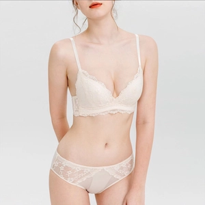 Lace lingerie set with beige triangle bralette and matching floral lace panties