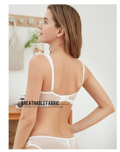 Detailed back view of white lace lingerie set featuring breathable mesh and delicate embroidery