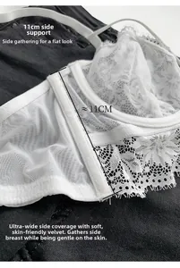 Detail of 11cm white lace side wing bra with soft fleece-lined mesh and floral embroidery
