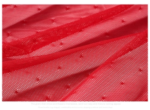 Close-up of red mesh fabric with polka dot jacquard for 3/4 cup breathable lace bra