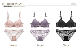 Completi intimi in pizzo beige, viola e nero con raffinati ricami floreali