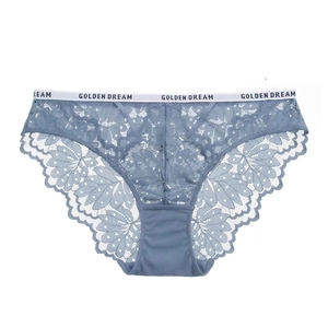 Detailed view of blue leaf lace panties with white elastic Golden Dream waistband