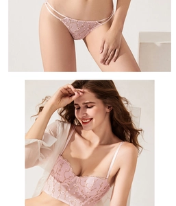 Détails du soutien-gorge en dentelle rose brodée et de la culotte à lanières assortie