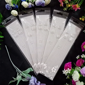 Detail view of 5 pairs of clear invisible bra straps with plastic hooks and adjusters