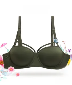 Detail view of olive green push-up bra with multi-strap back design and smooth cups