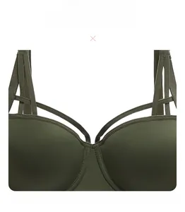 Detail of olive green push-up bra featuring sexy hollowed-out lace straps and smooth cups