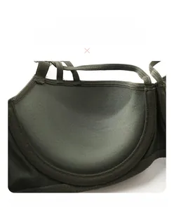 Detail of dark green push-up bra cups with smooth fabric and refined edge stitching