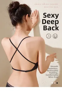 Detailed back view of seamless U-shaped backless bra with cross straps and removable pads