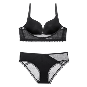 Sexy black U-back wireless bra set with matching polka dot lace trim and sheer mesh panties